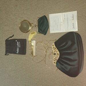 Judith Leiber Emerald Green Satin Evening Formal Bag with gold details.